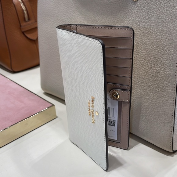 Kate Spade Madison Large Slim Bifold Wallet
Meringue 
NWT - Picture 11 of 16